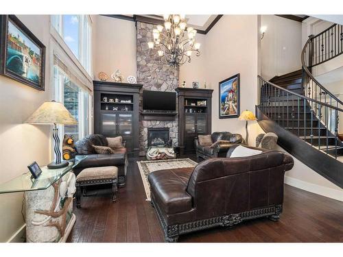 145 Aspen Glen Place Sw, Calgary, AB - Indoor With Fireplace