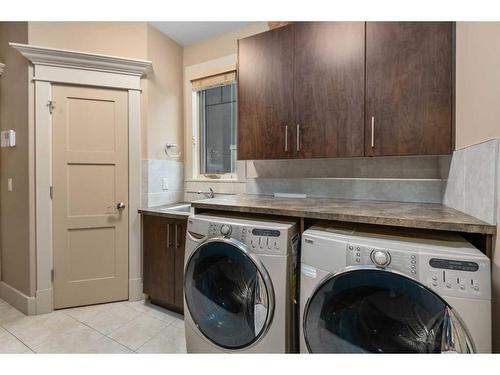 145 Aspen Glen Place Sw, Calgary, AB - Indoor Photo Showing Laundry Room
