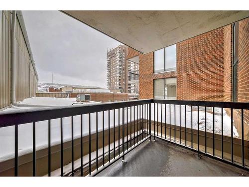 306-145 Point Drive Nw, Calgary, AB - Outdoor With Balcony With Exterior