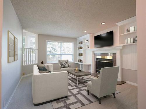 1490 Sunwood Road Se, Calgary, AB - Indoor Photo Showing Living Room With Fireplace