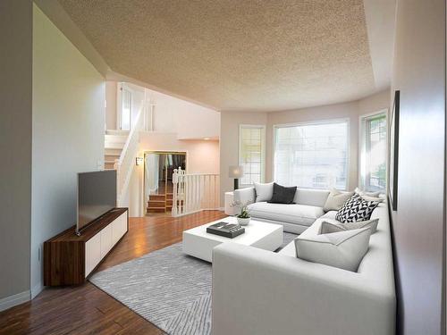 1490 Sunwood Road Se, Calgary, AB - Indoor Photo Showing Living Room