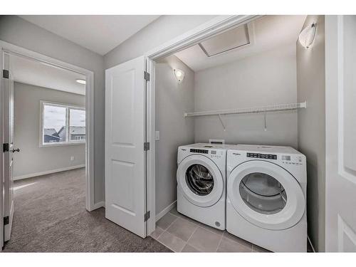 251 Aquila Way Nw, Calgary, AB - Indoor Photo Showing Laundry Room