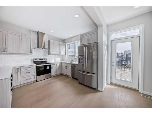 251 Aquila Way Nw, Calgary, AB - Indoor Photo Showing Kitchen With Stainless Steel Kitchen With Upgraded Kitchen