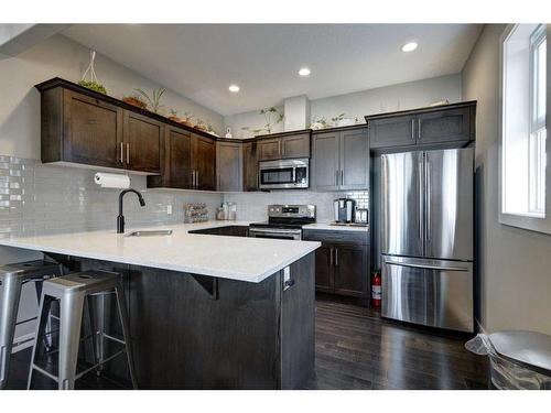 1-405 33 Avenue Ne, Calgary, AB - Indoor Photo Showing Kitchen With Upgraded Kitchen