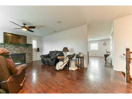 510 Wildflower Road Nw, Strathmore, AB - Indoor Photo Showing Living Room With Fireplace