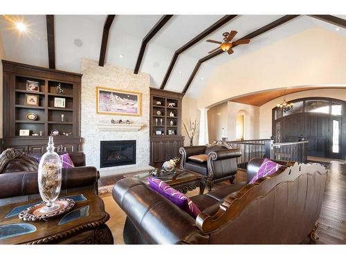 124 Grizzly Rise, Rural Rocky View County, AB - Indoor Photo Showing Living Room With Fireplace