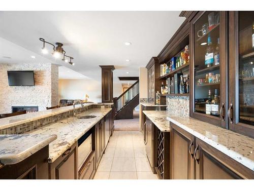 124 Grizzly Rise, Rural Rocky View County, AB - Indoor Photo Showing Kitchen With Double Sink