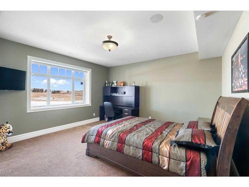 124 Grizzly Rise, Rural Rocky View County, AB - Indoor Photo Showing Bedroom