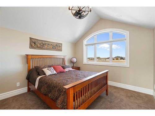 124 Grizzly Rise, Rural Rocky View County, AB - Indoor Photo Showing Bedroom