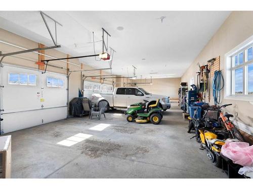 124 Grizzly Rise, Rural Rocky View County, AB - Indoor Photo Showing Garage