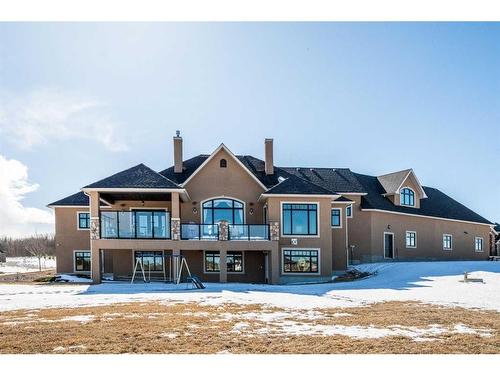 124 Grizzly Rise, Rural Rocky View County, AB - Outdoor With Facade