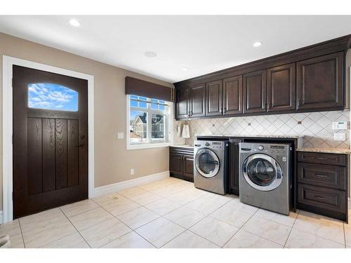 124 Grizzly Rise, Rural Rocky View County, AB - Indoor Photo Showing Laundry Room