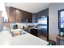 609-788 12 Avenue Sw, Calgary, AB  - Indoor Photo Showing Kitchen With Stainless Steel Kitchen With Double Sink 