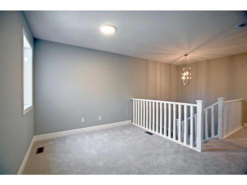 139 Mill Road, Cochrane, AB - Indoor Photo Showing Other Room