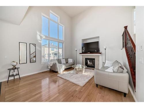 202 Topaz Gate, Chestermere, AB - Indoor Photo Showing Living Room With Fireplace