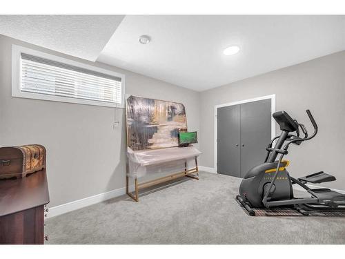 904 East Lakeview Road, Chestermere, AB - Indoor Photo Showing Gym Room
