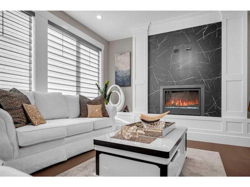 904 East Lakeview Road, Chestermere, AB - Indoor Photo Showing Living Room With Fireplace