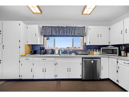 1064 Highway 587, Rural Red Deer County, AB - Indoor Photo Showing Kitchen With Double Sink