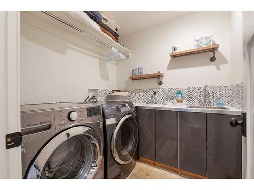 501 Hawk'S Nest Lane, Priddis Greens, AB - Indoor Photo Showing Laundry Room