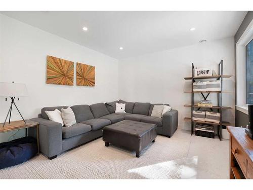 501 Hawk'S Nest Lane, Priddis Greens, AB - Indoor Photo Showing Living Room