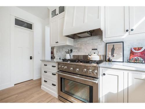 501 Hawk'S Nest Lane, Priddis Greens, AB - Indoor Photo Showing Kitchen With Upgraded Kitchen