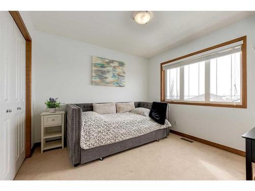 34 Rockyledge Rise Nw, Calgary, AB - Indoor Photo Showing Bedroom