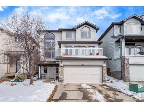 34 Rockyledge Rise Nw, Calgary, AB - Outdoor With Balcony With Facade