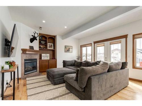 34 Rockyledge Rise Nw, Calgary, AB - Indoor Photo Showing Living Room With Fireplace