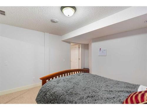 123 Chapala Crescent Se, Calgary, AB - Indoor Photo Showing Bedroom