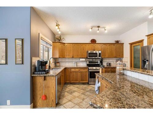 123 Chapala Crescent Se, Calgary, AB - Indoor Photo Showing Kitchen With Double Sink