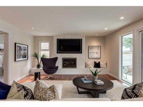 43 Bay View Drive Sw, Calgary, AB - Indoor Photo Showing Living Room With Fireplace