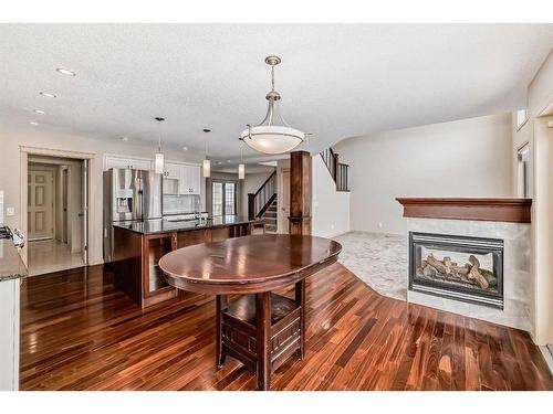 1A Tusslewood Drive Nw, Calgary, AB - Indoor Photo Showing Living Room With Fireplace