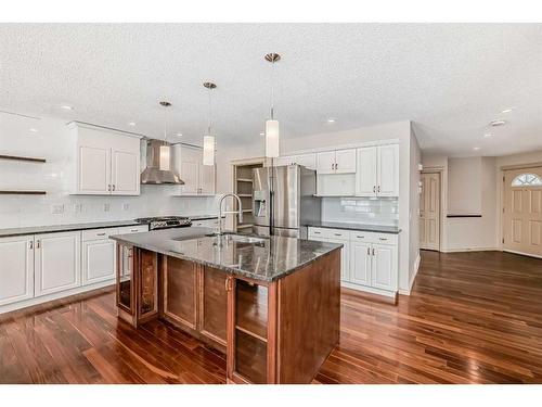 1A Tusslewood Drive Nw, Calgary, AB - Indoor Photo Showing Kitchen With Upgraded Kitchen