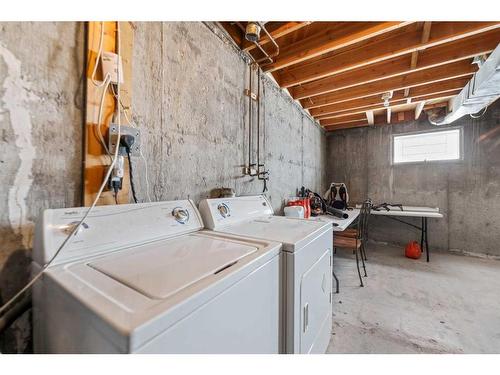 61 Huntford Close Ne, Calgary, AB - Indoor Photo Showing Laundry Room