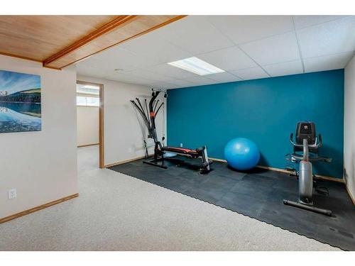 5 Bow Ridge Lane, Cochrane, AB - Indoor Photo Showing Gym Room