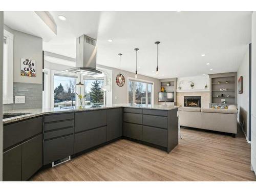 23 Suncanyon Park Se, Calgary, AB - Indoor Photo Showing Kitchen With Upgraded Kitchen