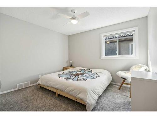 23 Suncanyon Park Se, Calgary, AB - Indoor Photo Showing Bedroom