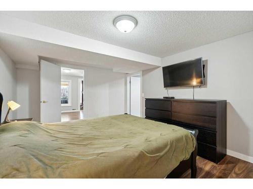23 Suncanyon Park Se, Calgary, AB - Indoor Photo Showing Bedroom