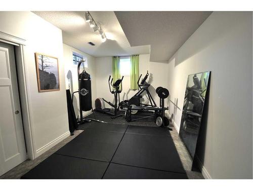 1305 5 Street Ne, Calgary, AB - Indoor Photo Showing Gym Room