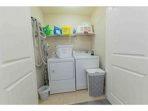 325 Saddlemont Boulevard Ne, Calgary, AB - Indoor Photo Showing Laundry Room