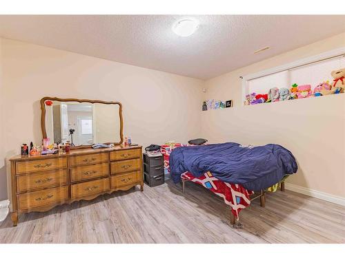 325 Saddlemont Boulevard Ne, Calgary, AB - Indoor Photo Showing Bedroom