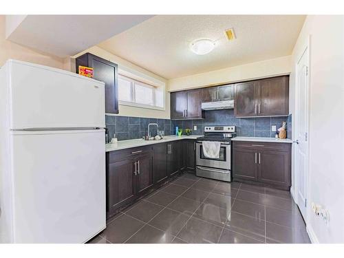 325 Saddlemont Boulevard Ne, Calgary, AB - Indoor Photo Showing Kitchen