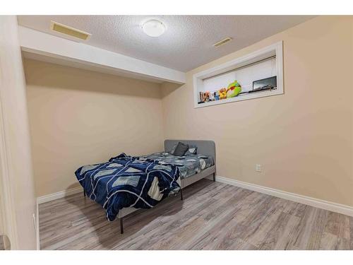 325 Saddlemont Boulevard Ne, Calgary, AB - Indoor Photo Showing Bedroom