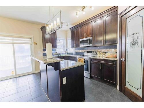 325 Saddlemont Boulevard Ne, Calgary, AB - Indoor Photo Showing Kitchen With Upgraded Kitchen