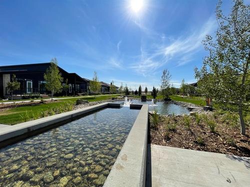 211 Marina Cove Se, Calgary, AB - Outdoor With Body Of Water