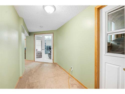 38 Arbour Butte Crescent Nw, Calgary, AB - Indoor Photo Showing Other Room