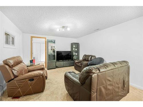 38 Arbour Butte Crescent Nw, Calgary, AB - Indoor Photo Showing Living Room