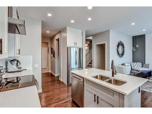 246 Legacy Heights Se, Calgary, AB - Indoor Photo Showing Kitchen With Double Sink