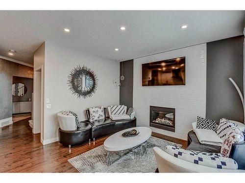 246 Legacy Heights Se, Calgary, AB - Indoor Photo Showing Living Room With Fireplace
