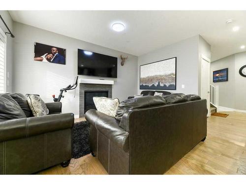 165 Ranch Rise, Strathmore, AB - Indoor Photo Showing Living Room With Fireplace